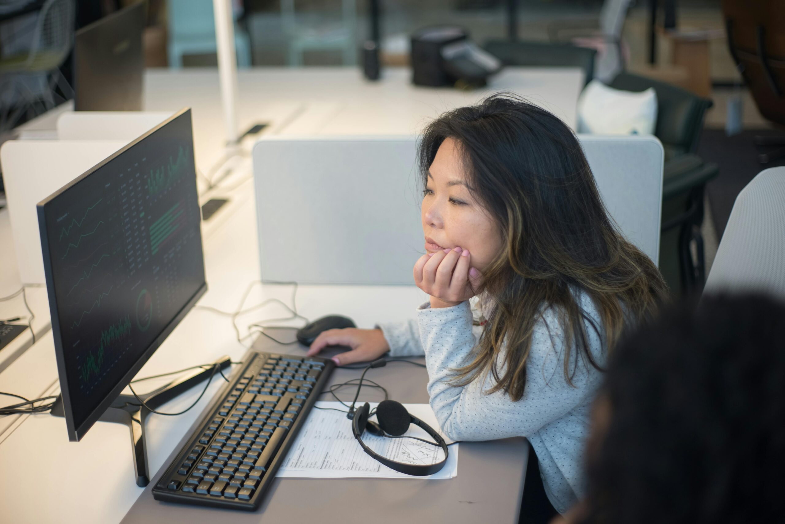 A Woman Sitting by the Computer